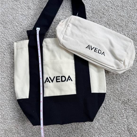 AVEDA Handbags - AVEDA Cream and Black Canvas Tote with Matching makeup bag